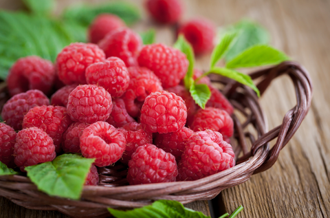 raspberries in a woven basket