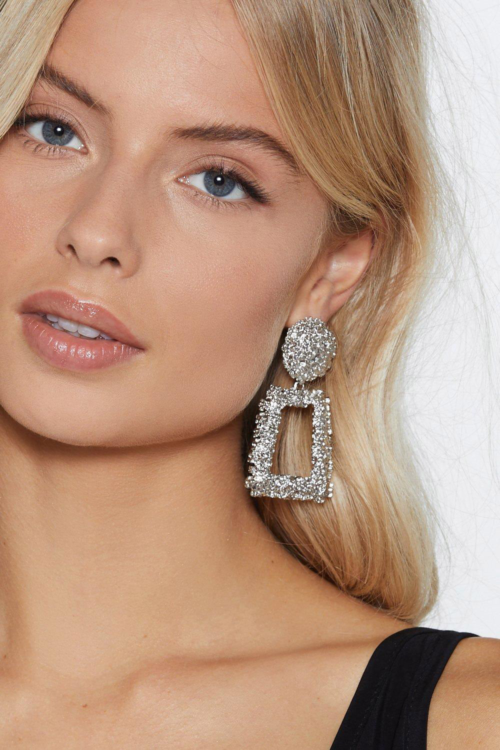 Girl wearing large earring