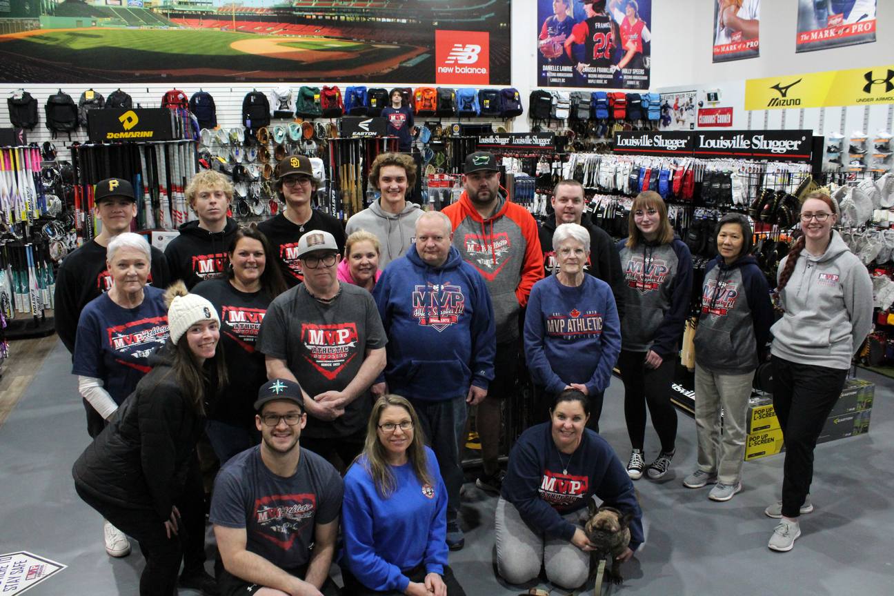 Group of MVP staff members in the store