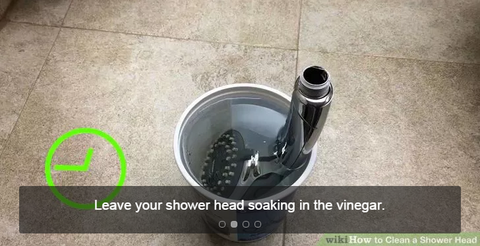 Leave the shower head in the vinegar for 1 hour