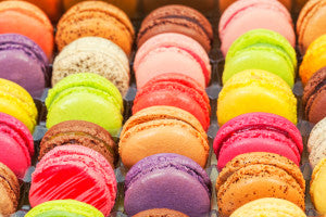 traditional french colorful macarons in a box