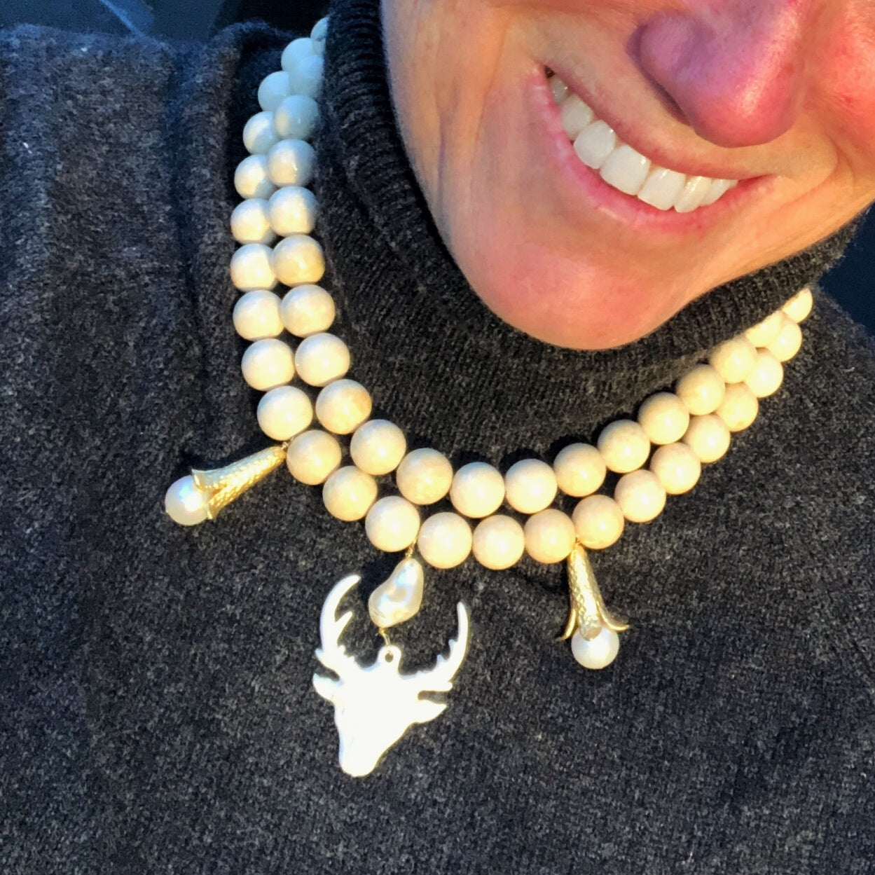 Stag head necklace in beige