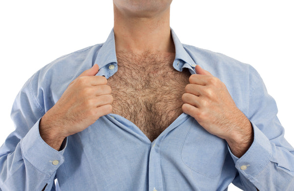 Man Opening His Shirt To Show Chest Hair