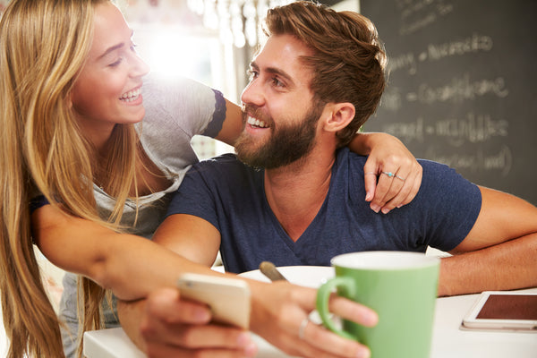 happy couple with bearded man