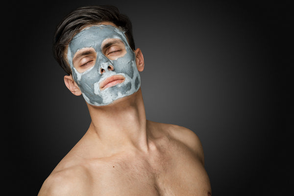 Man With A Skincare Face Mask On