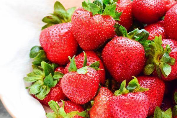 selected focus on a bunch of strawberries