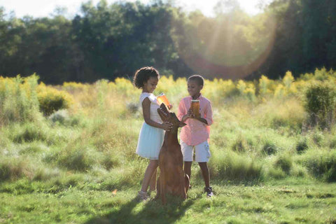 Zach and Zoë with their dog.