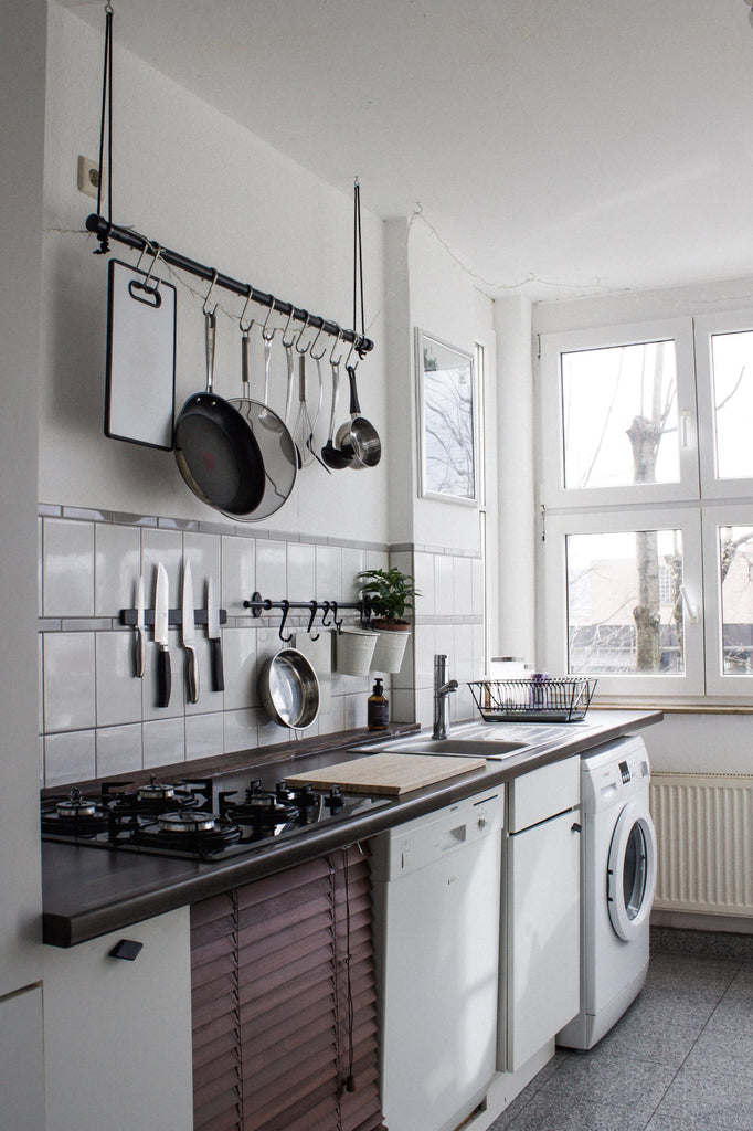 how to decorate kitchen walls with pots and pans