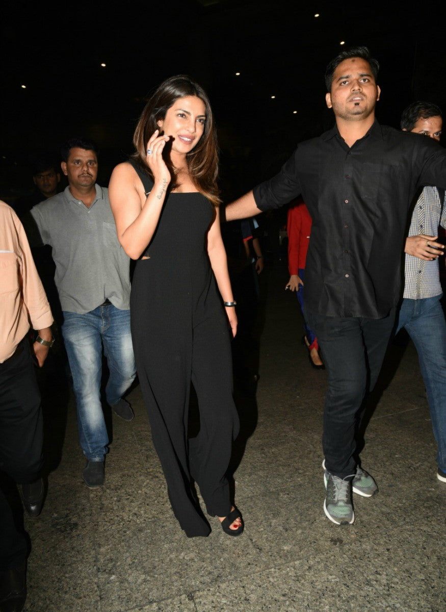 Priyanka Chopra Makes A Stylish Entry In Black Jumpsuit At The Airport