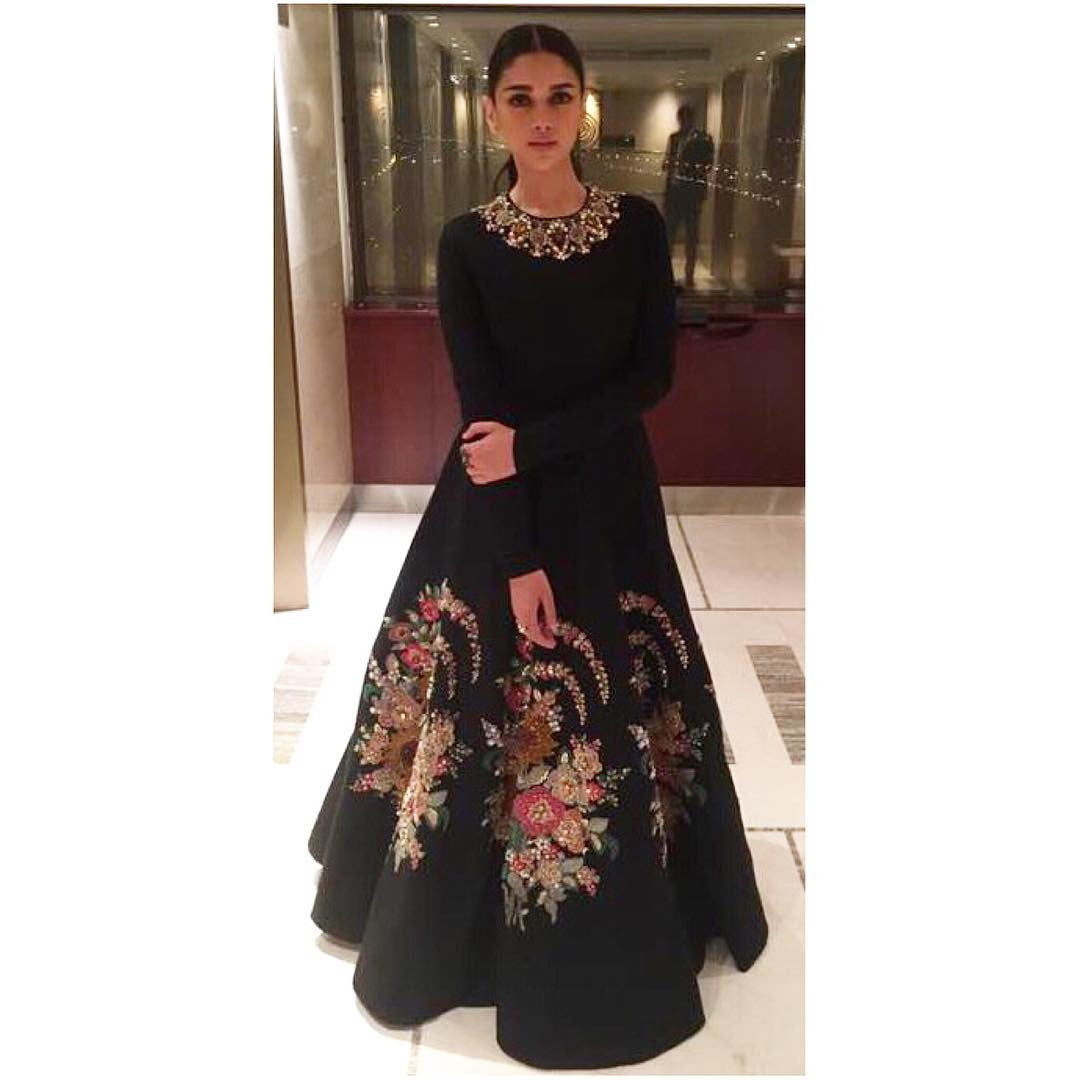 Aditi Rao Hydari in a black floral embroidered gown by Sabyasachi at Kaatru Veliyidai Promotional event 