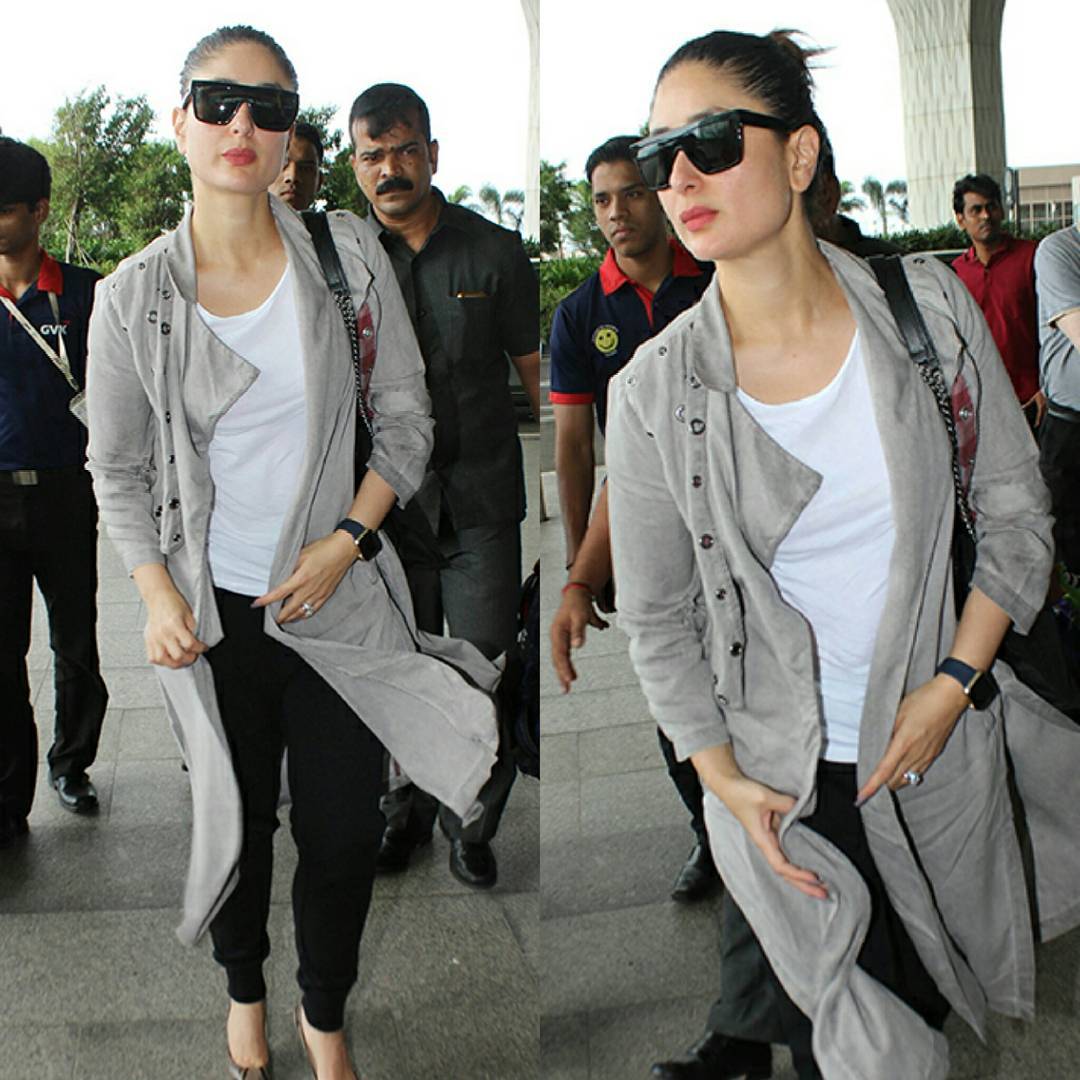 Kareena Kapoor Dressed in a plain white T-shirt, a pair of black jeggings and a long grey jacket,