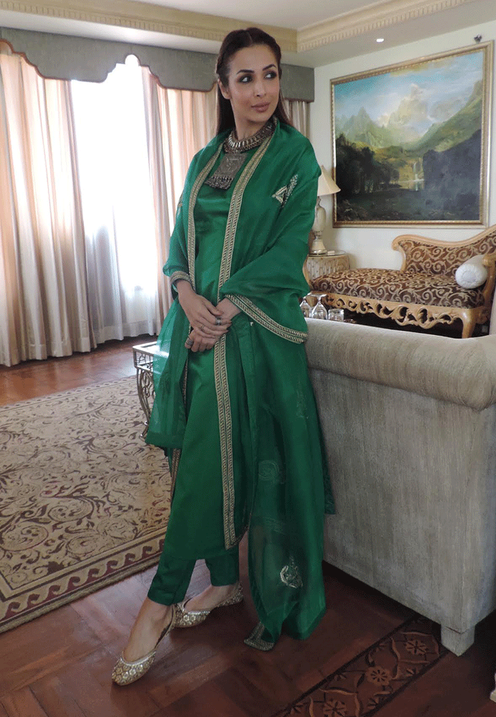 Malaika Arora Khan in raw mango collection's designer green raw silk salwar suit