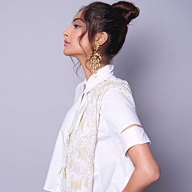 Sonam Kapoor opted for the white mogra palazzo saree which was teamed it up with a white Off-Duty Cropped shirt