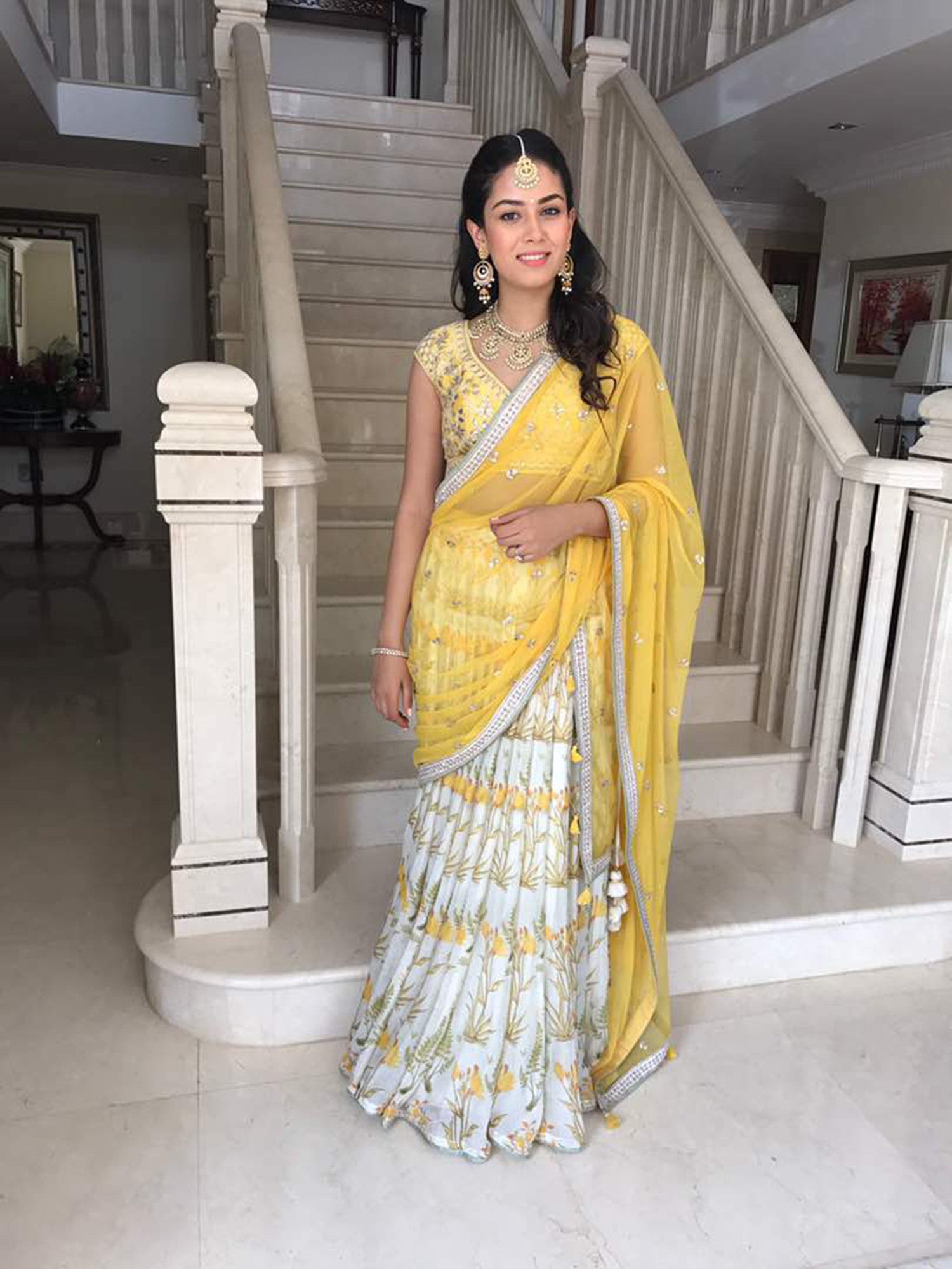 Mira Kapoor wearing an Anita Dongre lehenga and jewellery from Mahesh Notandass