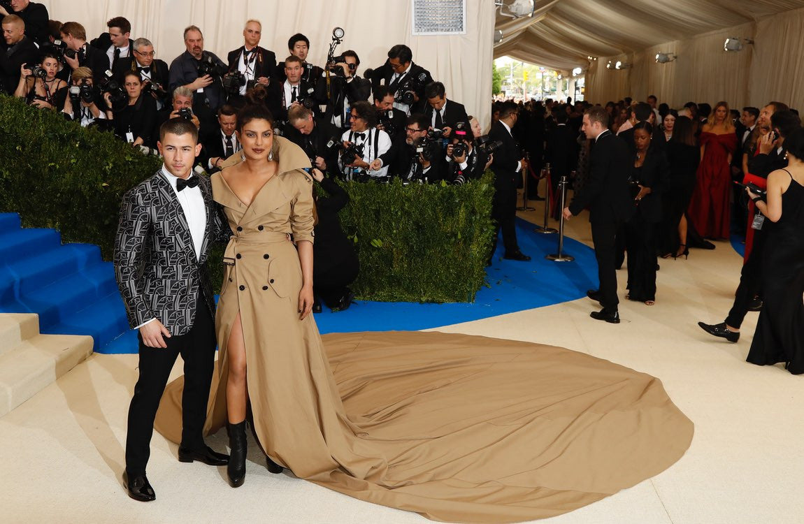 Priyanka Chopra Looked Jaw Drop Gorgeous in Ralph Lauren trench-coat gown longest trench coat and looks fierce AF Met Gala 2017