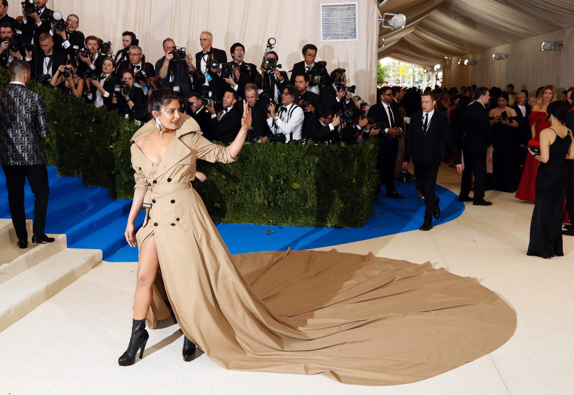 Priyanka Chopra Looked Jaw Drop Gorgeous in Ralph Lauren trench-coat gown longest trench coat and looks fierce AF Met Gala 2017