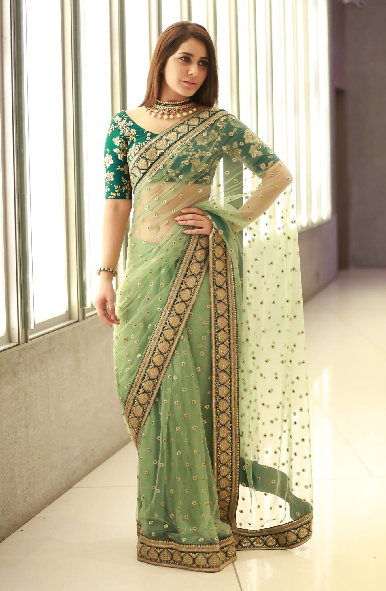 Green-Color-Designer-Net-Sarees-With-Booties-&-Border-Work