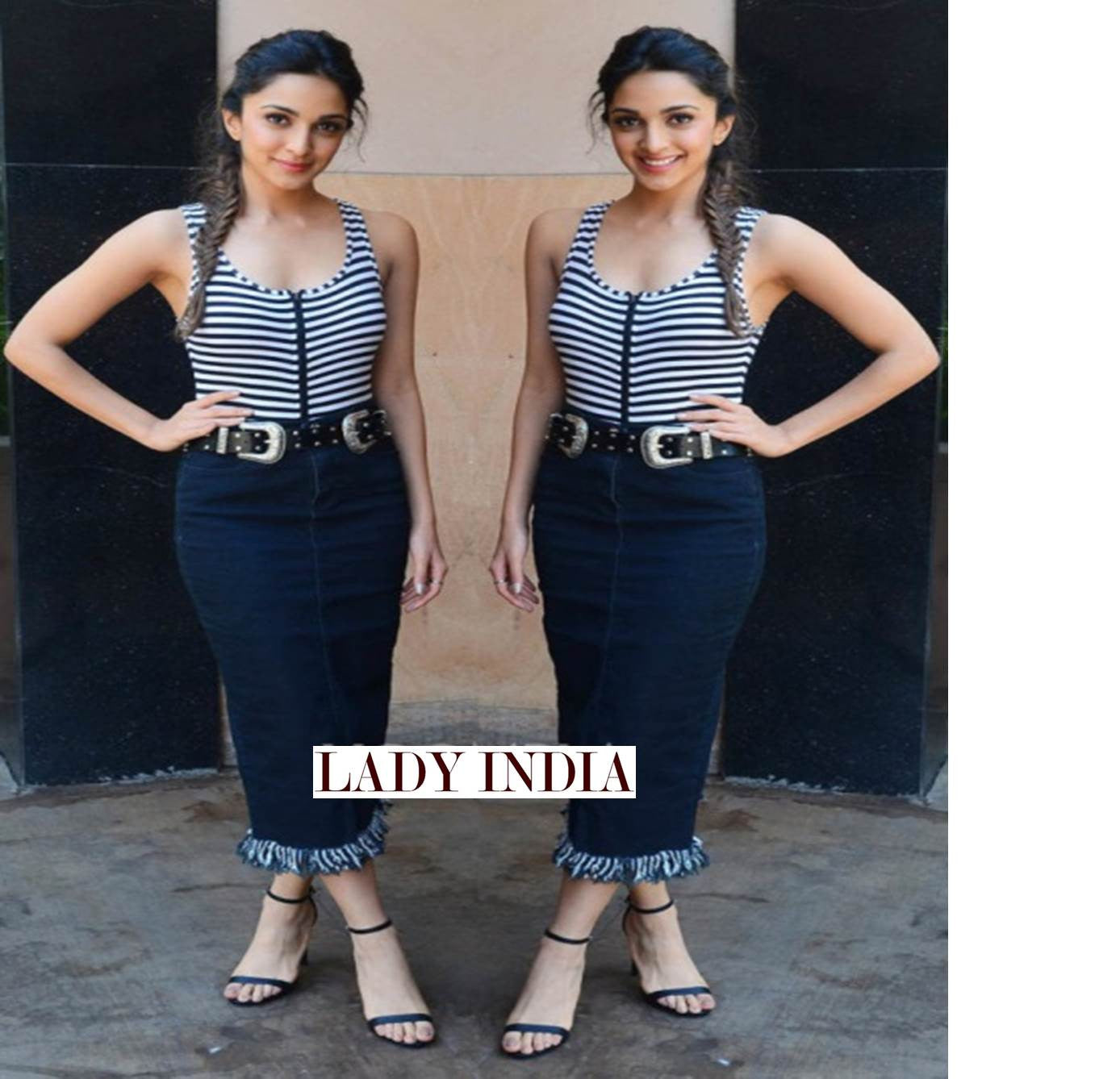Kiara Advani in striped tank top featuring a front zipper and a threaded navy blue skirt
