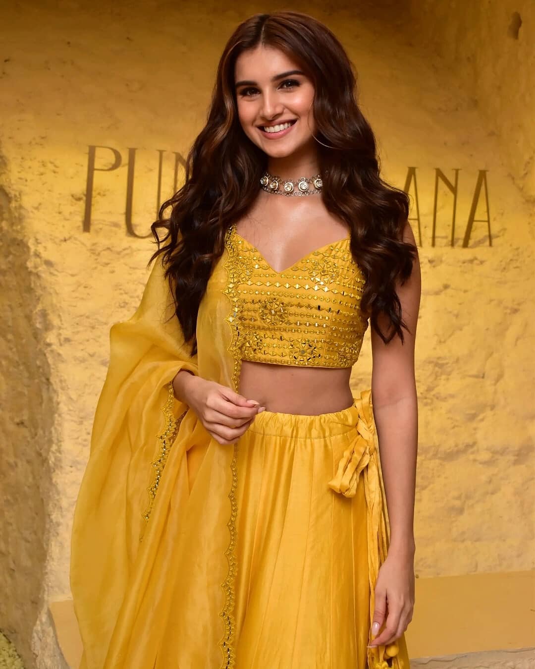 Tara Sutaria in Sunshine Yellow Lehenga by Designer Punit Balana 