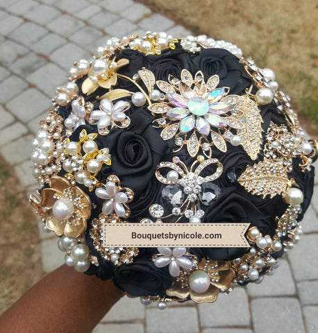 black and gold brooch