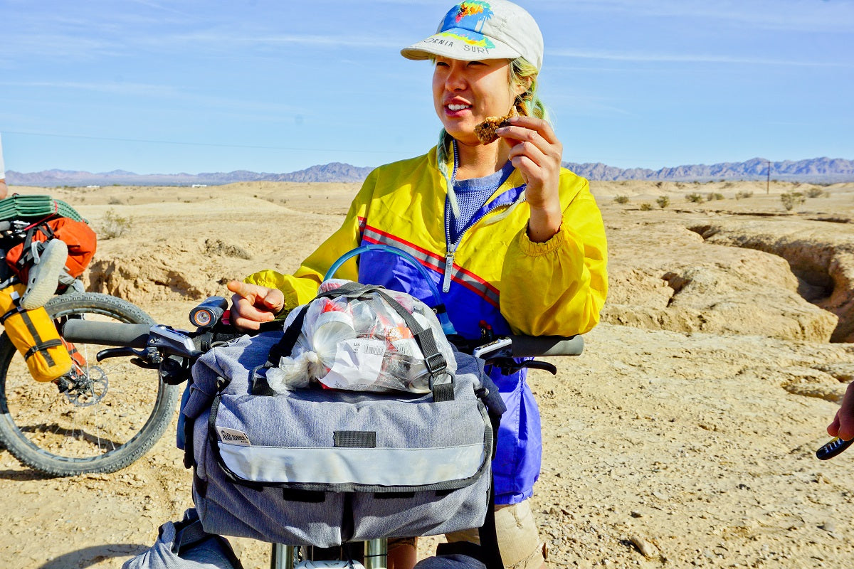 Ester Using Middle Earth Jammer on Bike Packing Trip