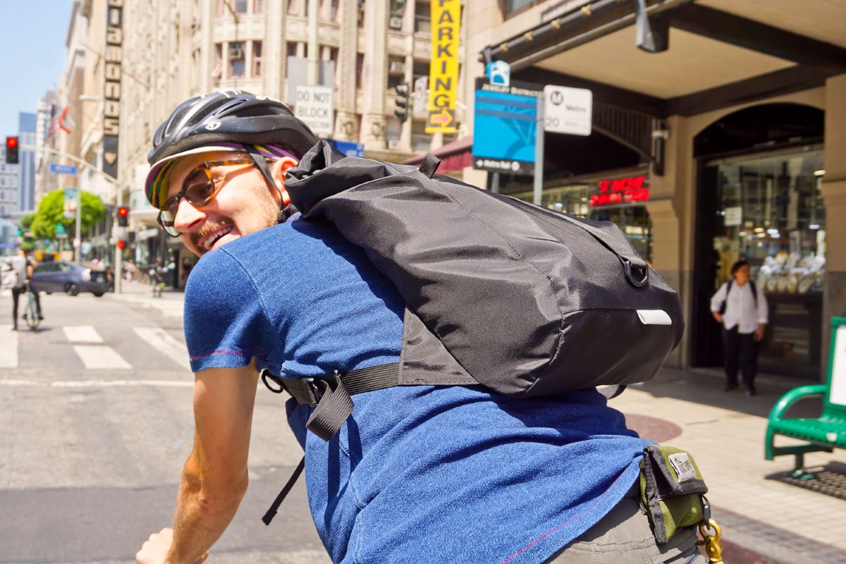 Matthew Riding with Road Runner Bags Backpack