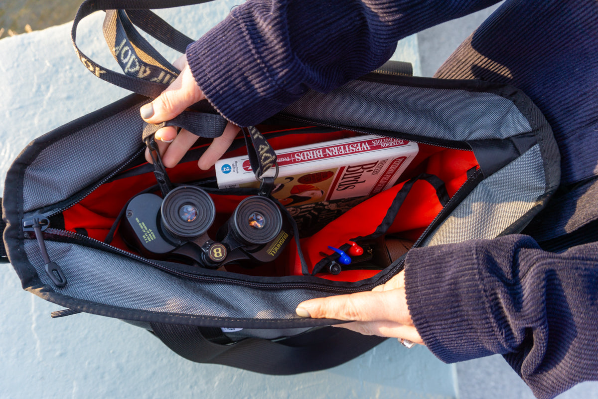 Road Runner Bags Everything Tote Bag with binoculars and book on birds inside