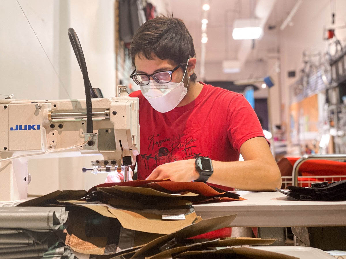 Juan Sewing at Road Runner Bags Shop