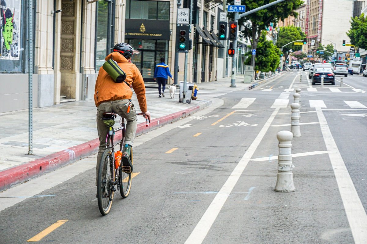 Matt riding using the Universal Shoulder Strap