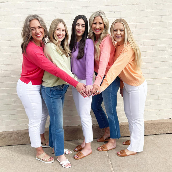 5 women standing sidways with their hands in the middle, modeling clothing from 308 Boutique