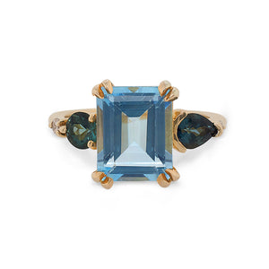 
                  
                    Load image into Gallery viewer, Front view of a large, emerald cut topaz, tourmaline and diamond ring cast in 14 kt yellow gold.
                  
                