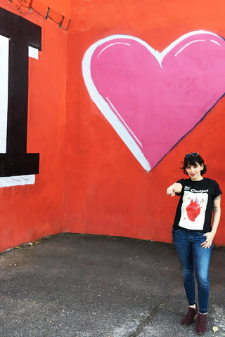 ShopMucho Owner models Native American clothing Mexican graphic tee shirt 