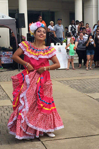 ShopMucho owner dresses as Frida Kahlo and attends the Day of the Dead festival, parade, and Frida Kahlo look a like contest