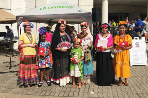 ShopMucho owner dresses as Frida Kahlo and attends the Day of the Dead festival, parade, and Frida Kahlo look a like contest