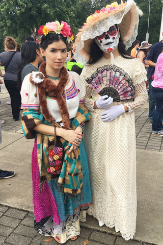 ShopMucho owner dresses as Frida Kahlo and attends the Day of the Dead festival, parade, and Frida Kahlo look a like contest