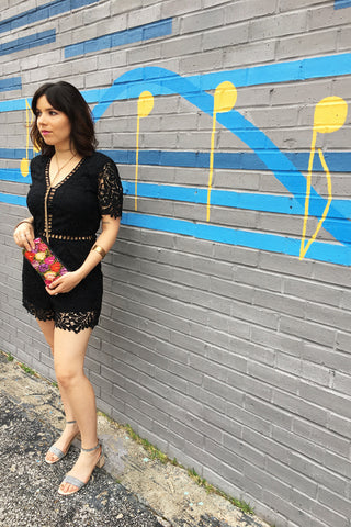 ShopMucho owner models women's black lace romper for a night out in Midtown Memphis