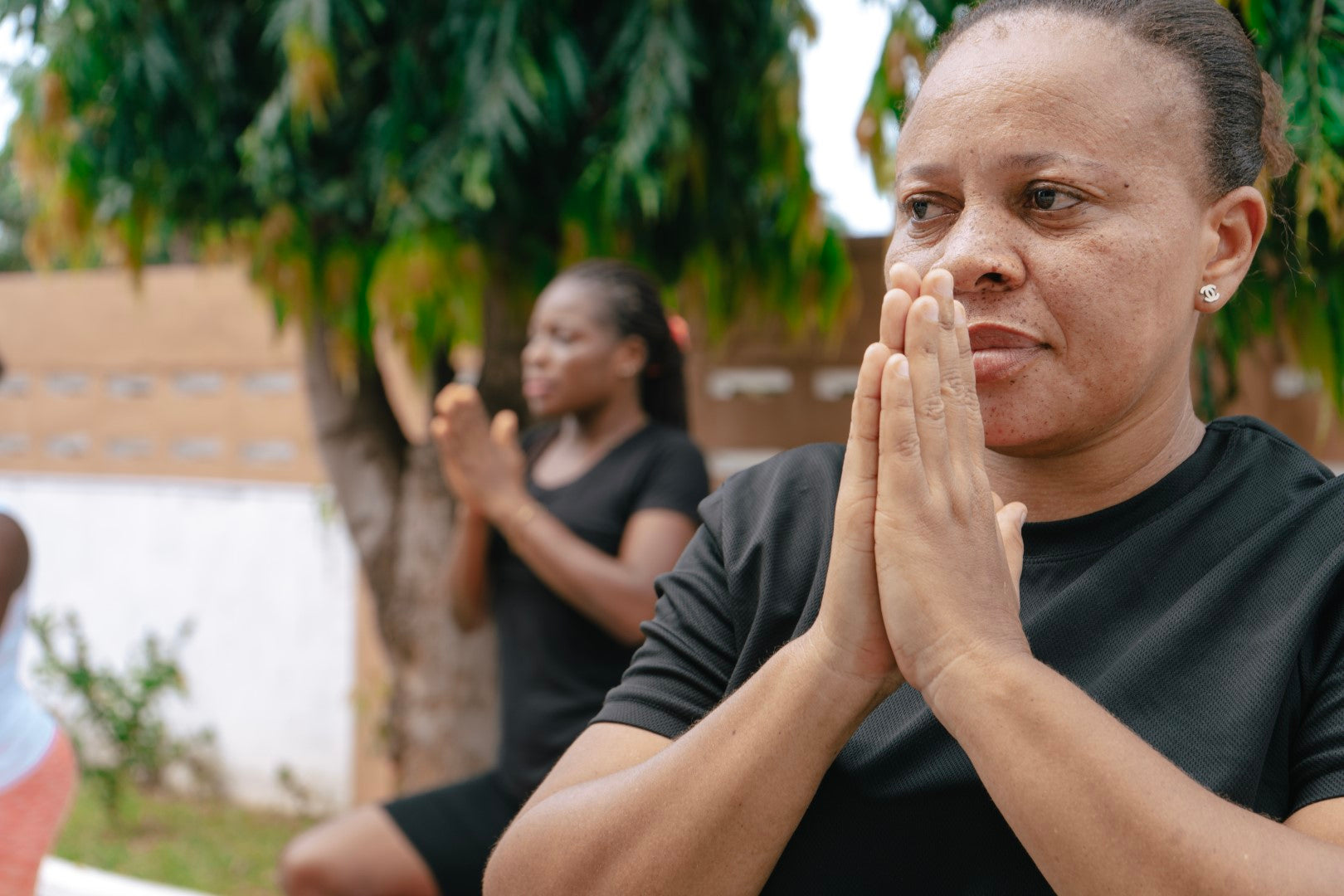 Team members engaging in a yoga session at Osei-Duro’s headquarters.