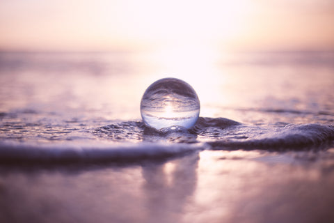 Drop of water on the beach