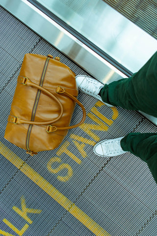 Baggage being taken to the airport security checkpoint for boarding