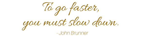 Text that says "To go faster, you must slow down." 