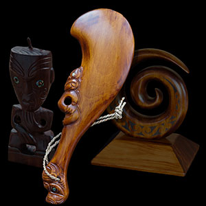 Wooden Maori weapons and sculptures