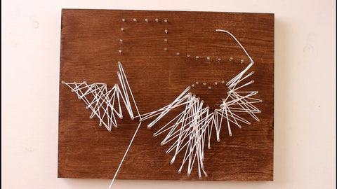 string white floss to create DIY state string art