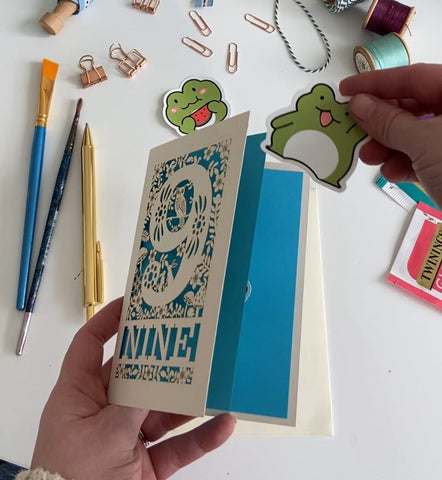 adding stickers to a card