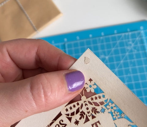 attach glue dots to your paper cut card