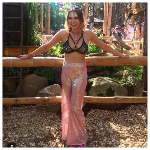 Insta famous lifestyle youtuber Lynsey Hughes aka Livin Like Lyndsey wears Isolated Heroes barbie sequin flares to Electric forrest festival