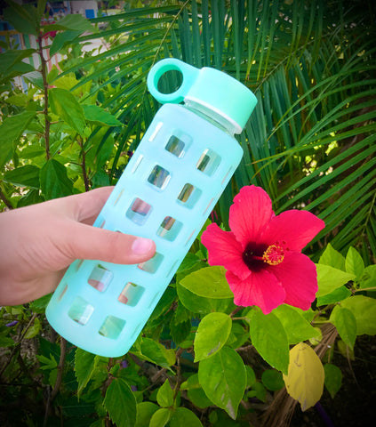 Purifyou bottle with flower