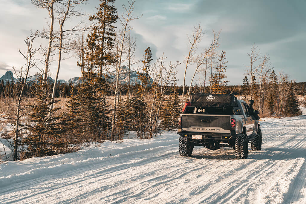 Toyota Tacoma on snowy back road