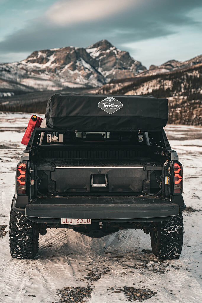 Midsize DECKED Drawer System installed in the bed of Toyota Tacoma