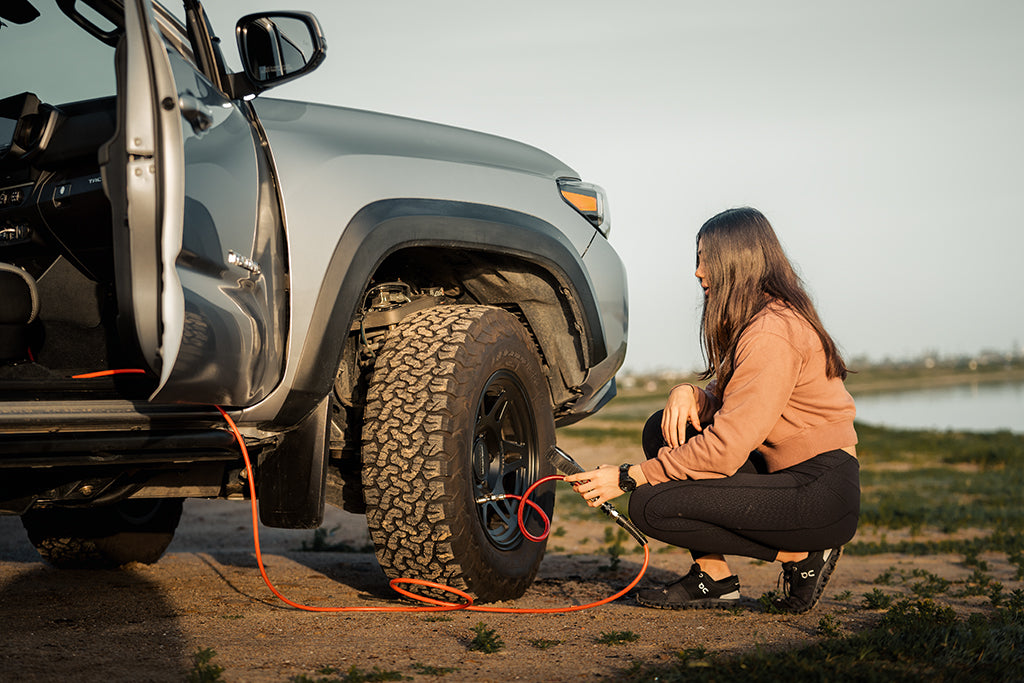 Image of Chloe airing up front right tire