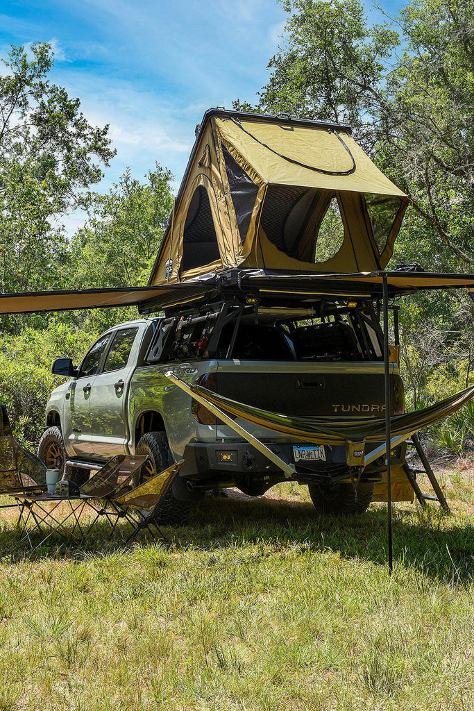 The Lunartik features a rooftop tent, Leitner Designs bed rack, and DECKED Drawer System